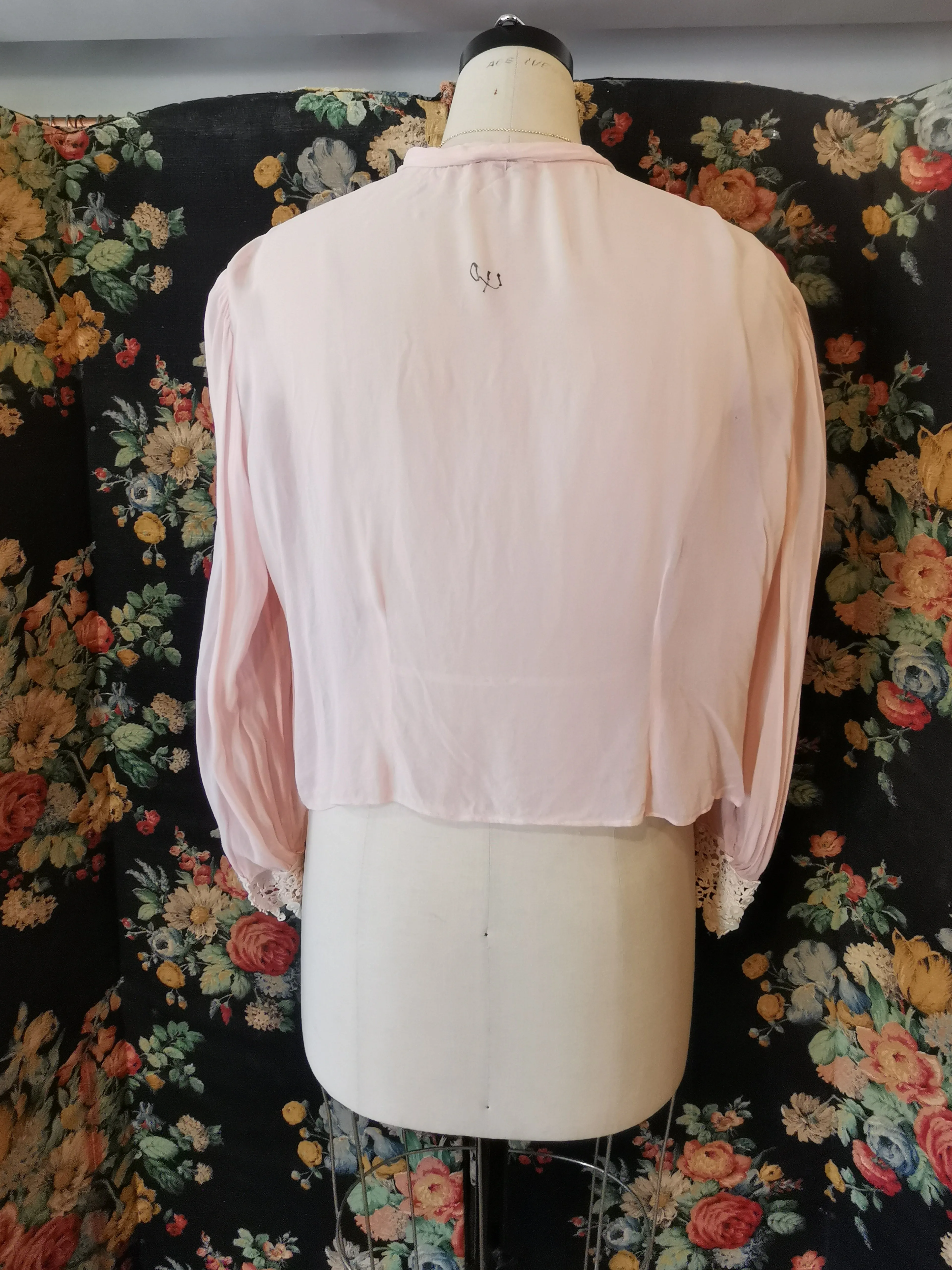 Pink silk blouse with lace trim