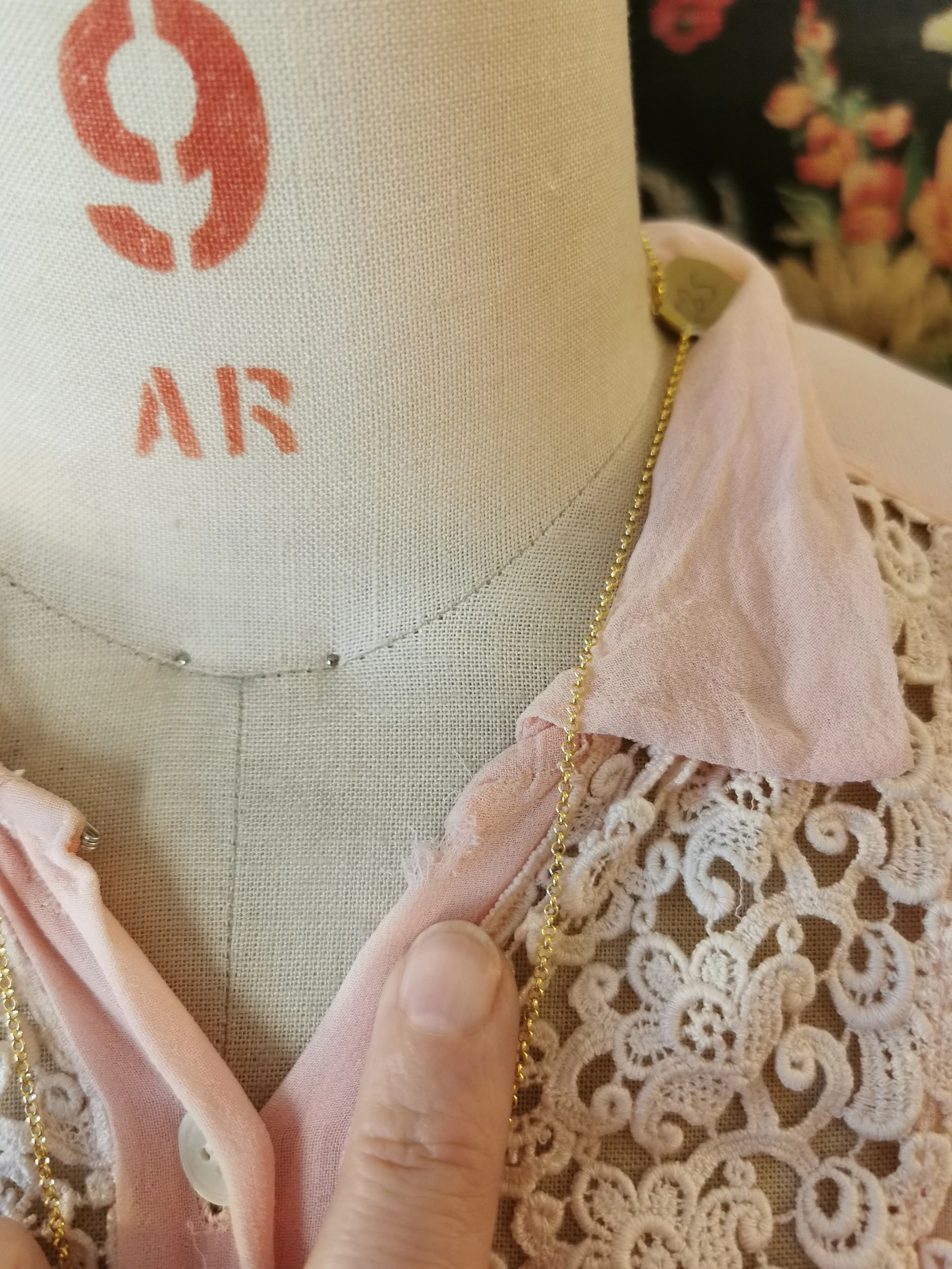 Pink silk blouse with lace trim