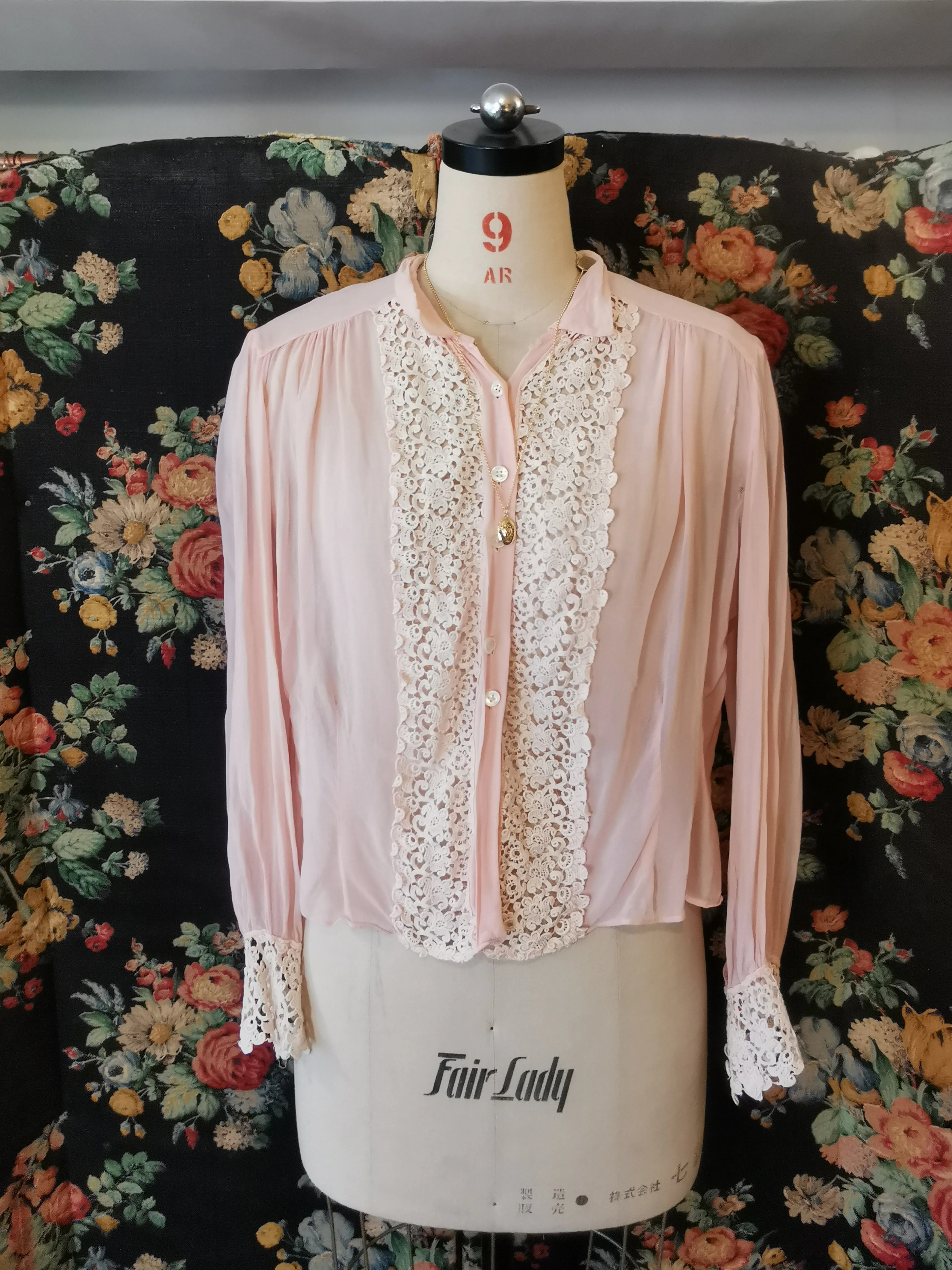 Pink silk blouse with lace trim