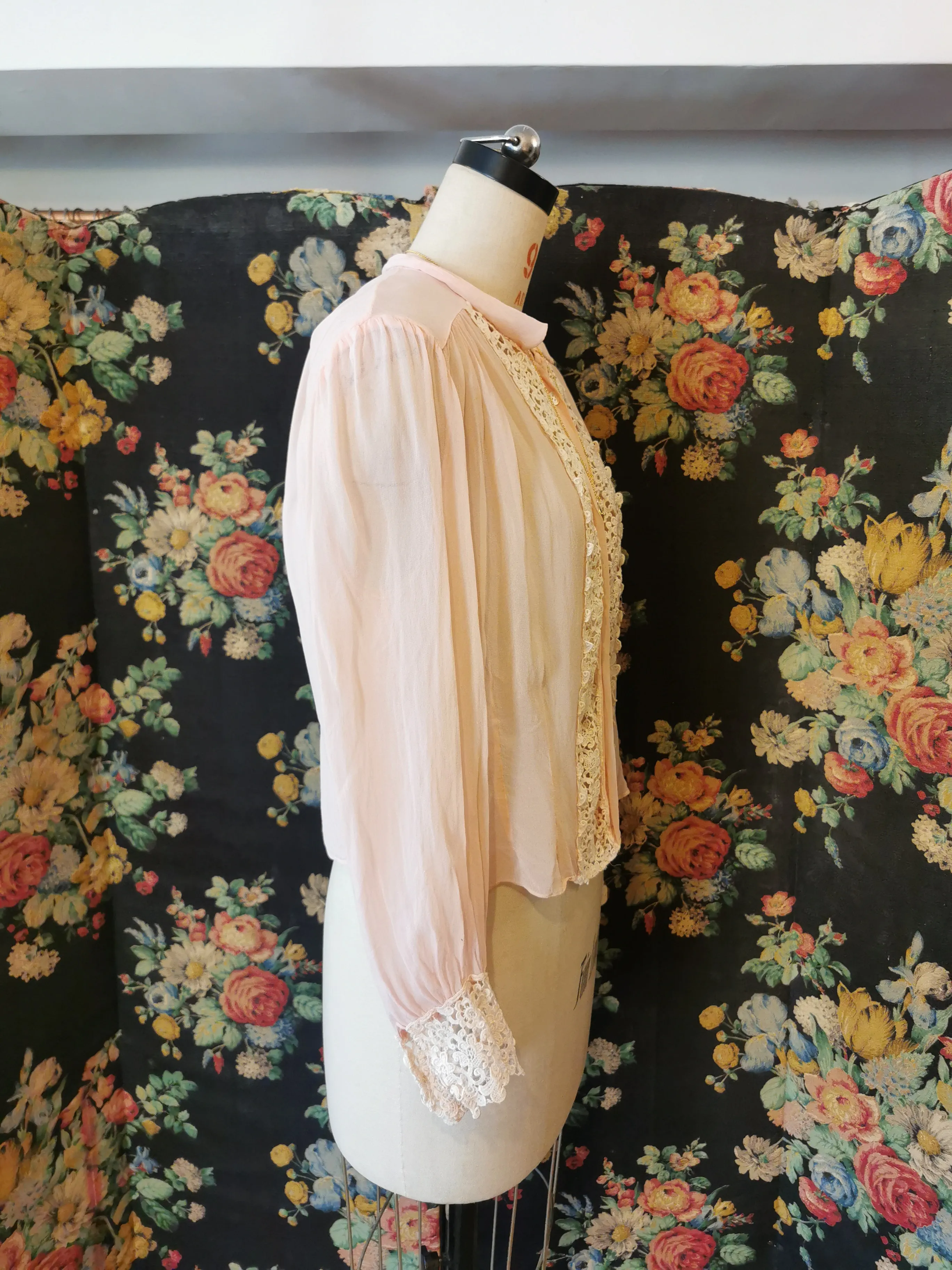 Pink silk blouse with lace trim