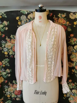 Pink silk blouse with lace trim