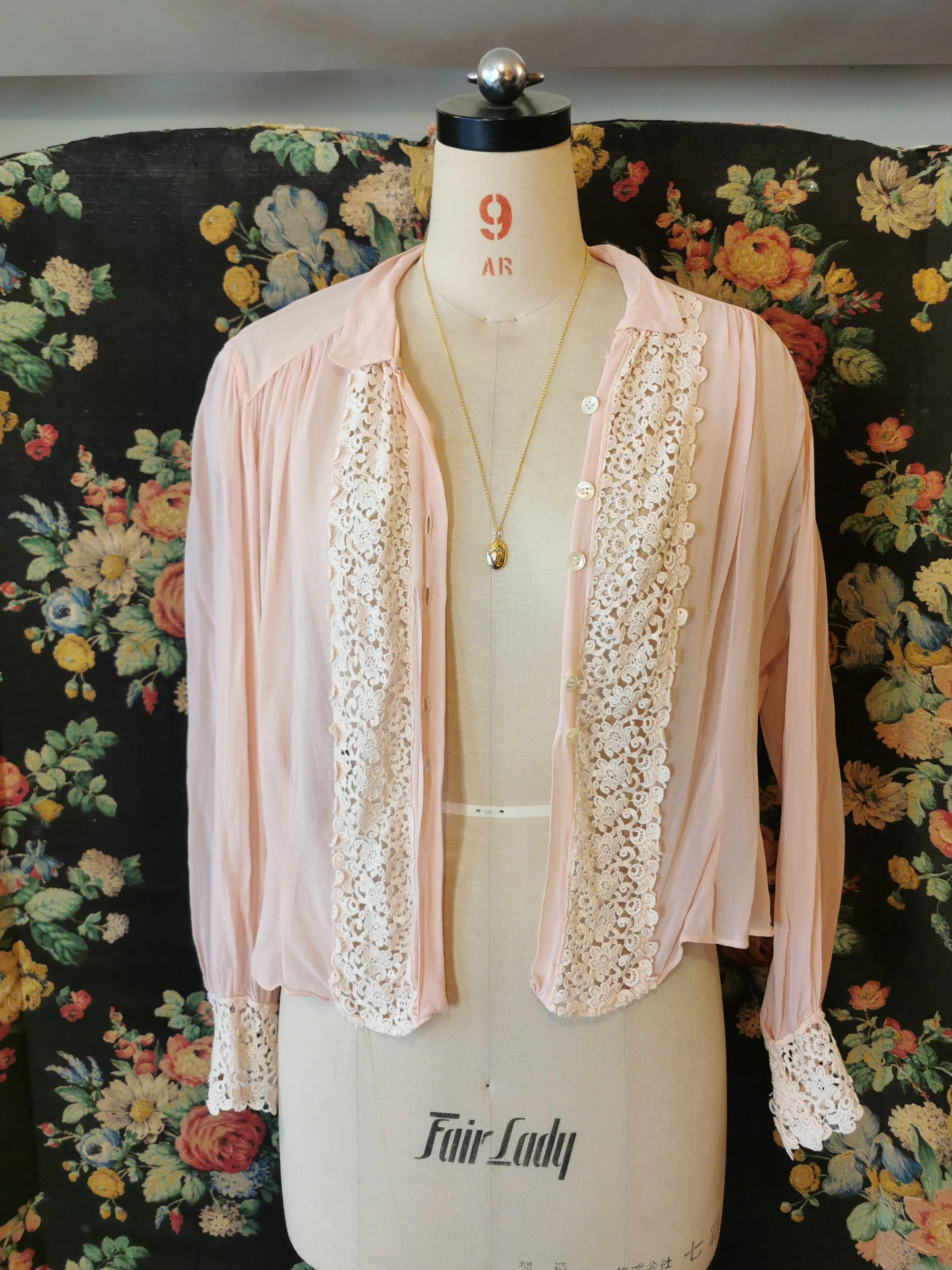 Pink silk blouse with lace trim